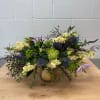 This airy arrangement is full with Agonis, Gunnie Eucalyptus, Globe Thistle, Pale