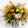 This autumn-forward arrangement includes calla lilies, tulips, and stock. Perfect for any