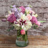 Beautiful assortment of Tulips, Lavender Roses, Stock, and Stargazer Lilies. Tulips will