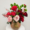 Mixed rose whimsical arrangement with pink and red roses, perfect for any