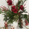 Add Holiday cheer with this beautiful Amaryllis, berries and holiday greens in