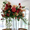 Perfect for your next event, our tall table centerpiece arrangement will add