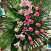 This beautiful tribute in all pink showcases Double Pink Oriental Lilies, Pink