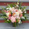 MINIMUM OF 24 HOURS NOTICE. A tall and lush arrangement for a