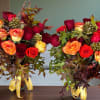 Celebrate the beauty of fall with this handcrafted rose arrangement duo. Featuring