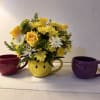 Cup of flowers. Give the gift of a smile with flowers. We