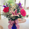 For the sassy, classy lady, this fresh bouquet features, lillies, roses, and