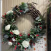 A very trendy and beautiful Christmas Wreath Silk Filled with berries, greens