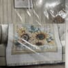 Soft and cozy plush throw. With a sunflower design   50