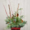 A colorful rustic outdoor planter; designed with a mix of pine, magnolia