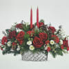 Capture the magic of Christmas with this lush winter rose centerpiece, arranged
