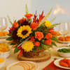 Celebrate the nostalgia of Thanksgiving with our charming Thanksgiving Cornucopia Arrangement. This