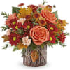 Capture their admiration with this enchanting fall rose arrangement, elegantly complemented by