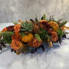 An elegant, contemporary, and textural collection of autumnal foliage and blooms -