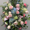 Absolutely beautiful standing spray piece! In this spray are light pink roses