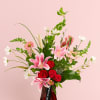 Lilies and roses in an artistic design.