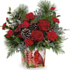 Paint a magical holiday scene with this cheerful Christmas bouquet, arranged in