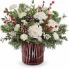 Gleaming like fresh snow on Christmas Day, this lovely white rose and