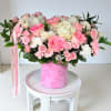 Mixed flowers with large pink box