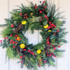 20&quot;-22&quot; fresh wreath contains mixed aromatic greenery, holly and faux fruit. This