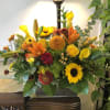 A beautiful assortment of fall flowers 
Hydrangea Roses Lillies 
And other premium