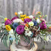 This beautiful and colorful flower arrangement will make you smile! Guaranteed! A