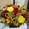 A beautiful fall arrangement with assorted premium flowers