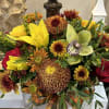 A beautiful assortment of hydrangeas, lilies, roses, chrysanthemums, and autumn fillers