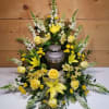 Yellow &amp; White Urn Surround by Savilles Country Florist.  Pay tribute