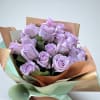 Lavender Roses wrapped into a beautiful bouquet