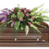 Colorful and vibrant flowers arranged beautifully in this casket spray.


A unique arrangement