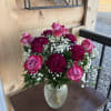 A lovely bouquet of Roses and Carnations using the specialty Rose called