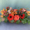 Beautiful centerpiece perfect for a table ( container may vary )
Flowers will