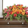 A vibrant display of orange and pink flowers arranged beautifully.


A unique arrangement