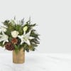 The Joyous Greetings Bouquet is an elegant collection of ivory, cream, and
