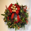 The Home for the Holidays Wreath is a fresh wreath that includes