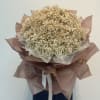 A luxurious  preserved full Baby,s breath bouquet in soft champagne-gold tones