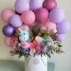 Give the all-in-one gift of balloons, flowers and a plush unicorn that