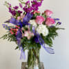 A fragrant arrangement of hydrangea, stock, roses, and statice.