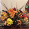 Brighten your table with this fall themed centerpiece!