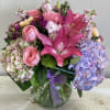 Wow them with this stunner...filled with roses, hydrangea, lilies and other beautiful
