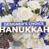 Beautiful Hanukkah (Chanukah) flower arrangements in blue and white make excellent hostess