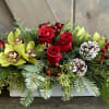 This elegant centerpiece is perfect for any Christmas Centerpiece. Flowers included are
