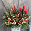 This tropical arrangement is will delight any tropical lover around this holiday