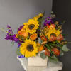 A beautiful selection of the freshest flowers in a vase uniquely arranged