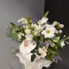 A beautifully selected bunch of the freshest flowers in a vase uniquely