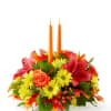 This vibrant fall centerpiece brings warmth and color to any seasonal table.
