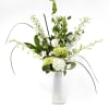 THIS SIMPLE ELEGANT ARRANGEMENT EASES TENSION JUST FROM ITS PHOTOGRAPH. IT HAS
