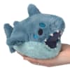 The Squishables Snackers Megalodon plush is a soft, adorable shark friend measuring