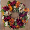 Send this stunning and brilliant colored fall wreath as the perfect gift